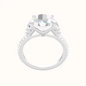 Diamond Band with Round Sidestone Trio Engagement Ring With Petal Four Prong Head