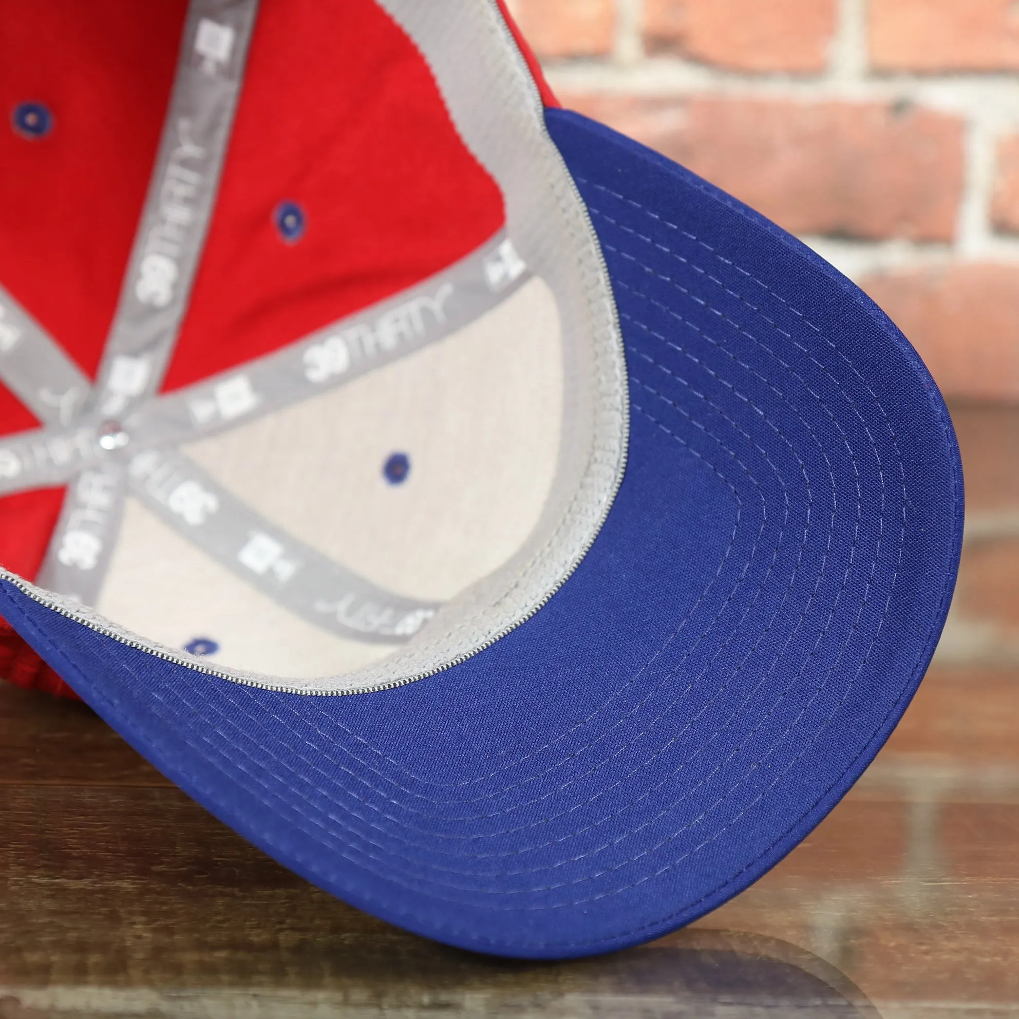 Philadelphia Phillies Liberty Bell Logo Blue Bottom 39Thirty Stretch Fit Cap | Red and Blue