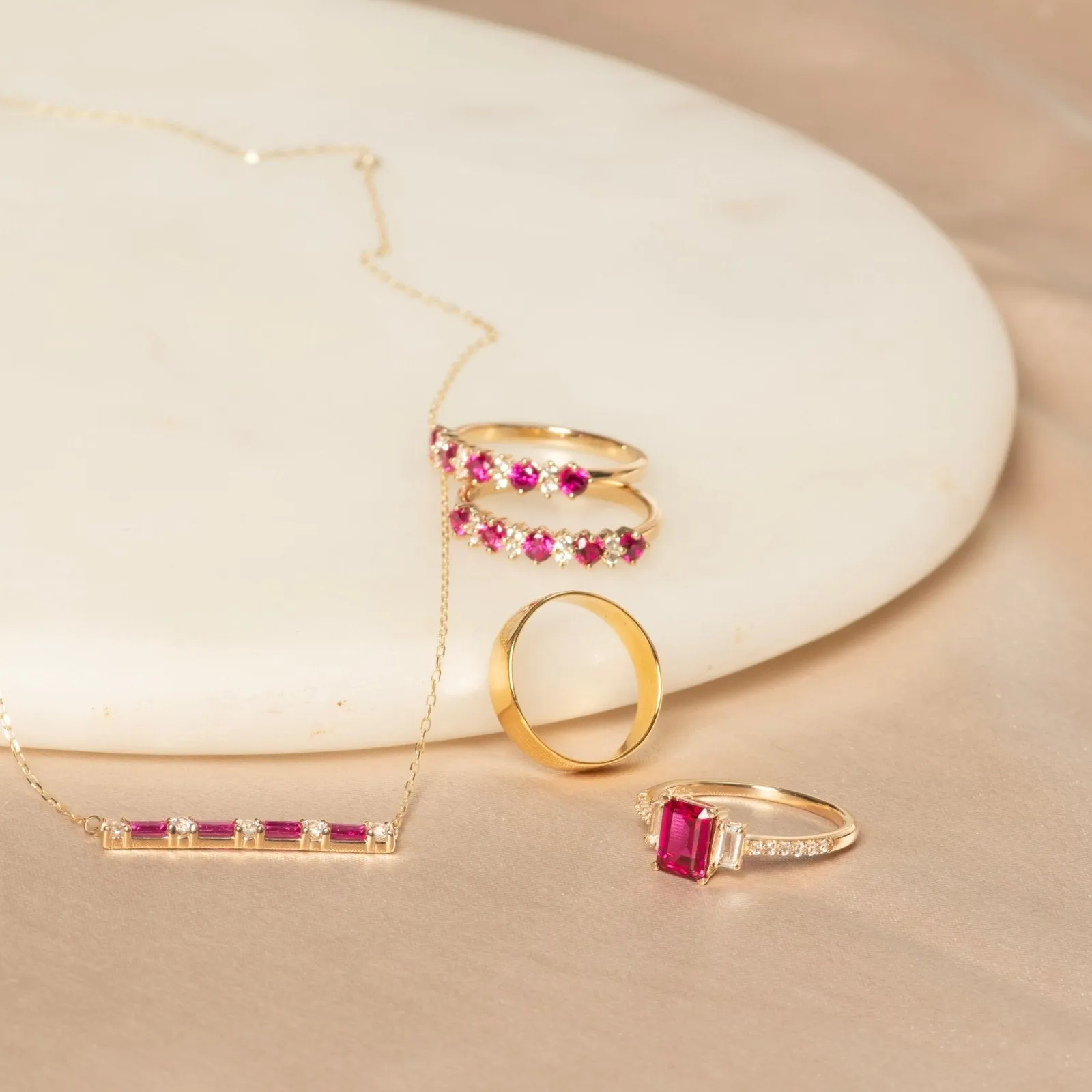 Three Stone Emerald Cut Ruby Ring with White Sapphire Band