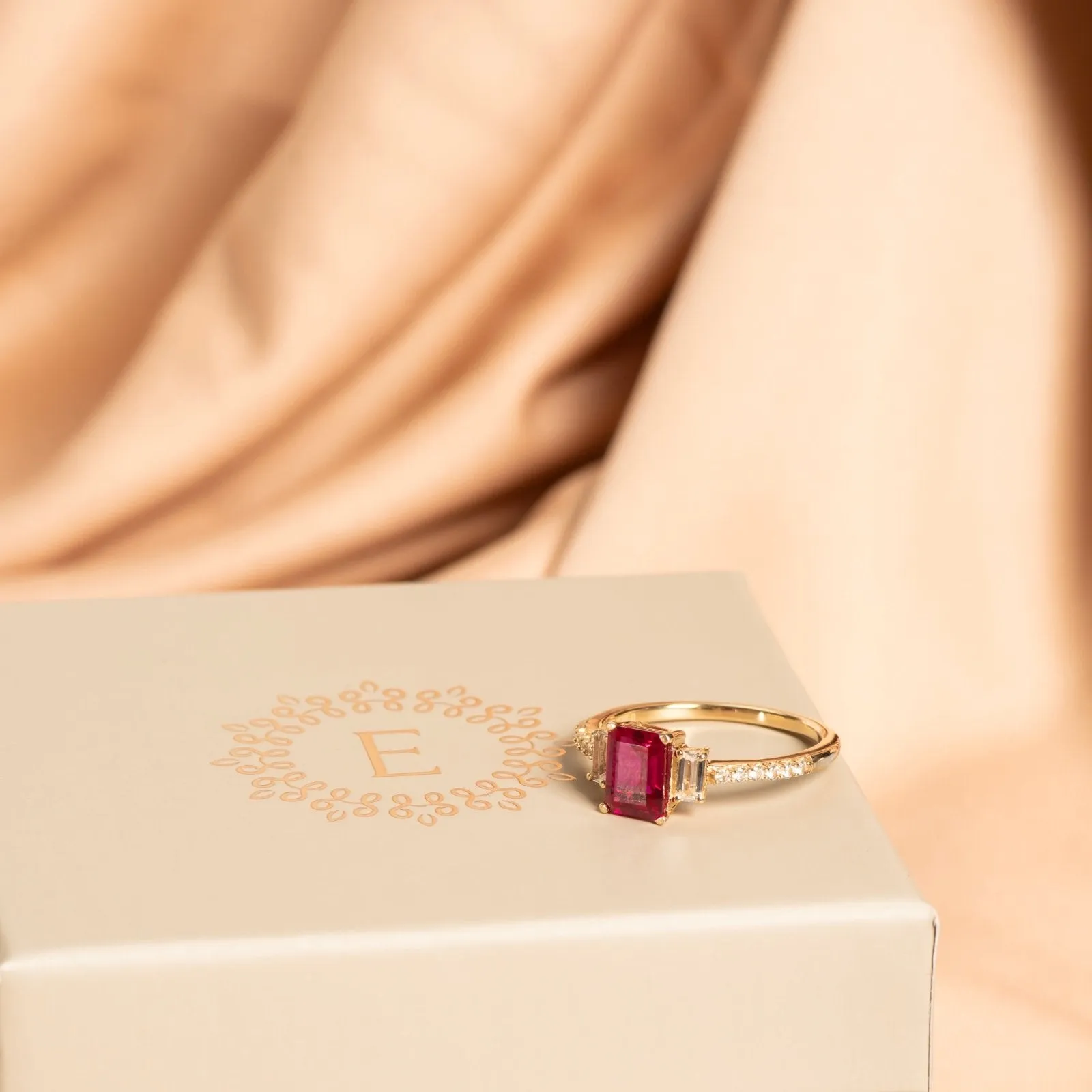 Three Stone Emerald Cut Ruby Ring with White Sapphire Band